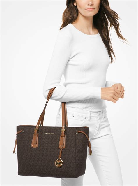 michael michael kors voyager medium logo tote bag|michael kors voyager tote merlot.